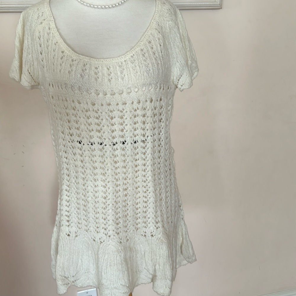 Free People ivory short sleeve blouse.